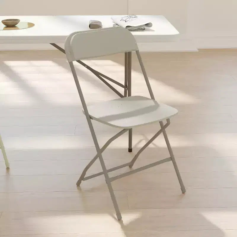 650 lb. Capacity Premium Home and Event Plastic Folding Chair (4 Pack)