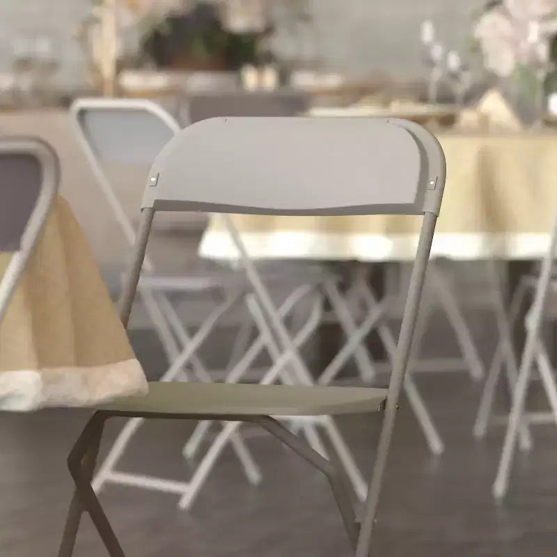 650 lb. Capacity Premium Home and Event Plastic Folding Chair (4 Pack)