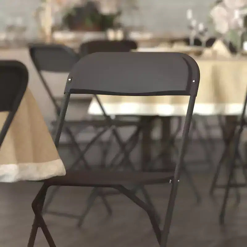 650 lb. Capacity Premium Home and Event Plastic Folding Chair (4 Pack)